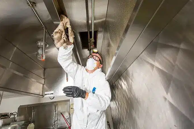 Solvents-man-in-mask-cleaning.jpg