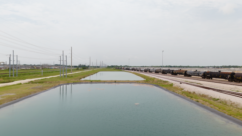 Retention pond and rail infrastructure near Diversified CPC’s Beaumont facility.